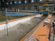 Физическое моделирование в волновом лотке трансформации и взаимодействия волн с берегозащитным сооружением в Керченском проливе